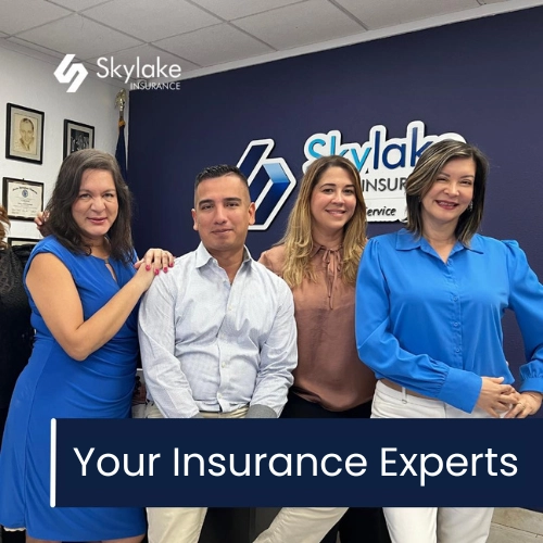 Insurance agents group smiling at the camera